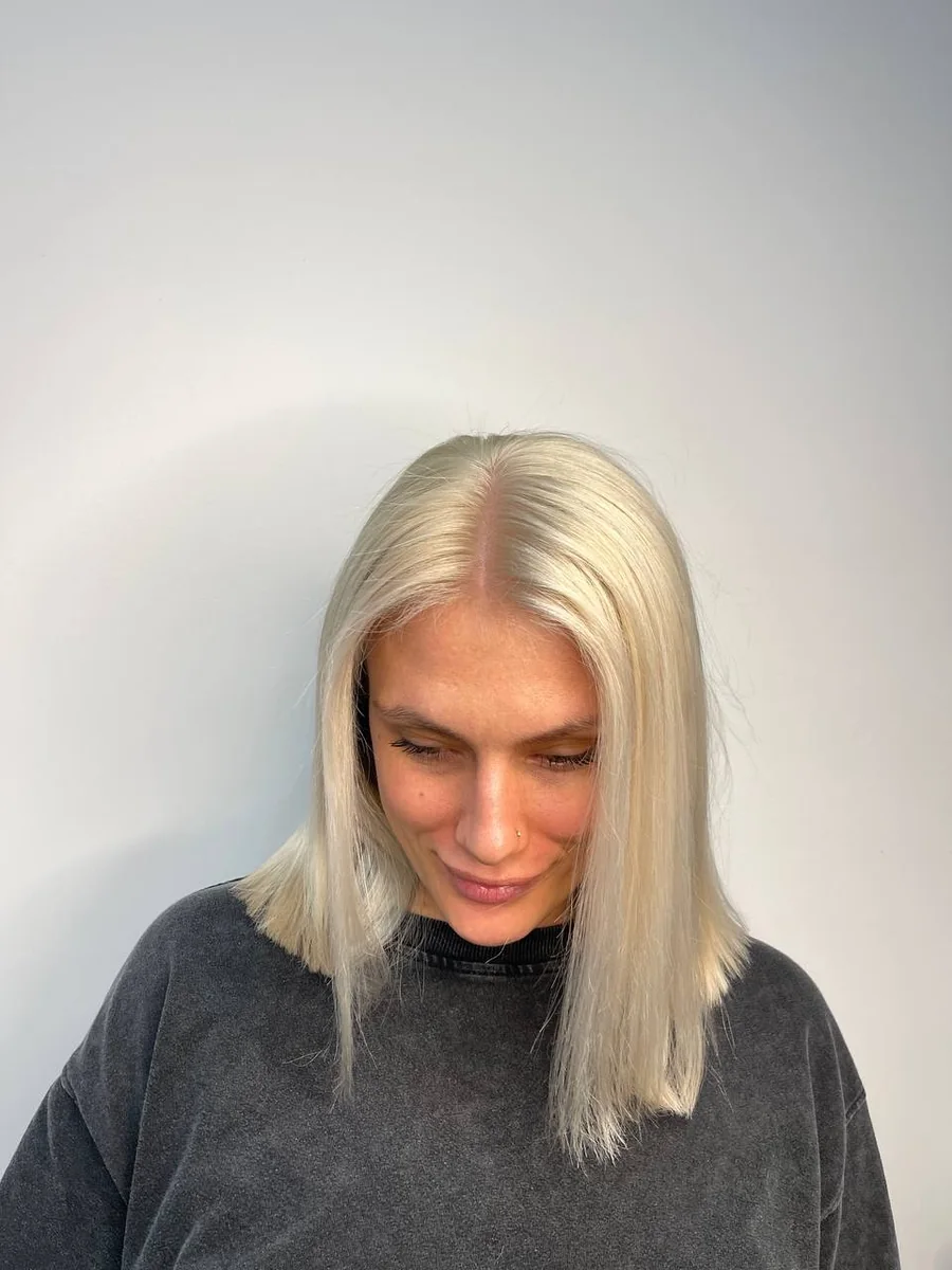 Icy platinum blonde, blunt shoulder cut by Liza G., Buffalo Grove IL