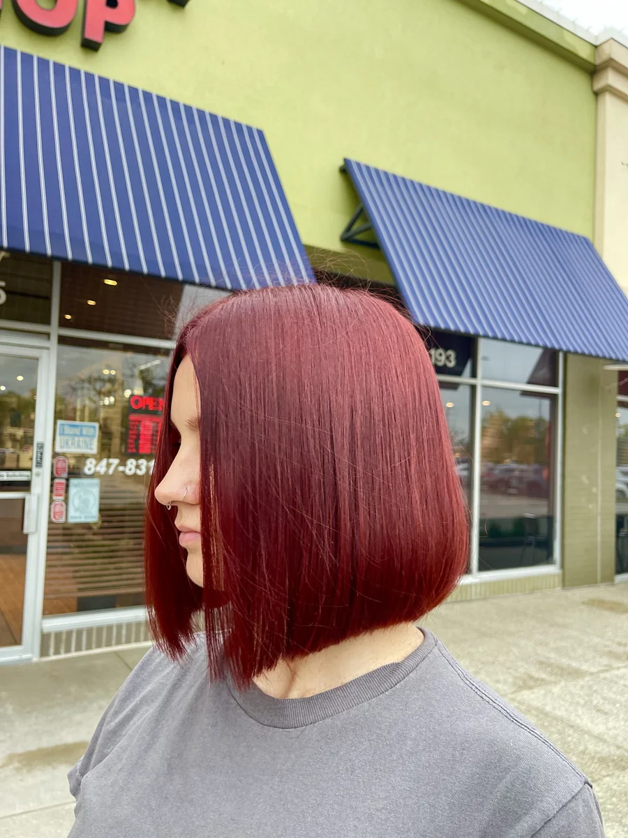 Cherry red sleek blunt bob by Liza G., Buffalo Grove IL